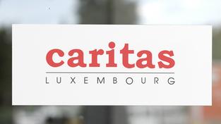Schild mit Logo der Caritas in Luxemburg (Foto: Caritas/Imago/Eibner)
