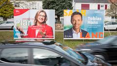 Auf Wahlplakaten sind die Spitzenkandidaten der SPD, Anke Relinger, und der CDU, Tobias Hans, zu sehen (Foto: picture alliance/dpa | Oliver Dietze)
