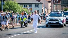 Fackelträger mit der Olympischen Flamme in Saargemünd (Foto: BeckerBredel)