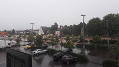 Überfluteter Parkplatz in Heusweiler (Foto: Andrea Einert)